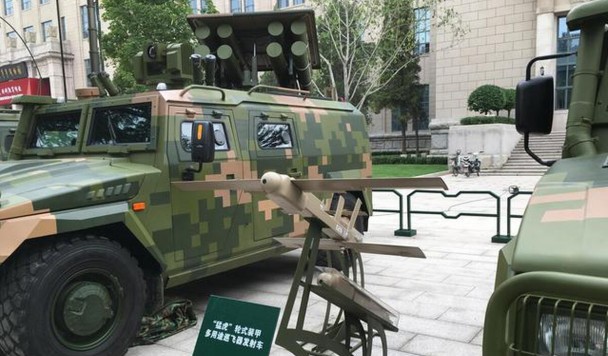 Китай разработал грузовик, запускающий над полем боя рой дронов-убийц